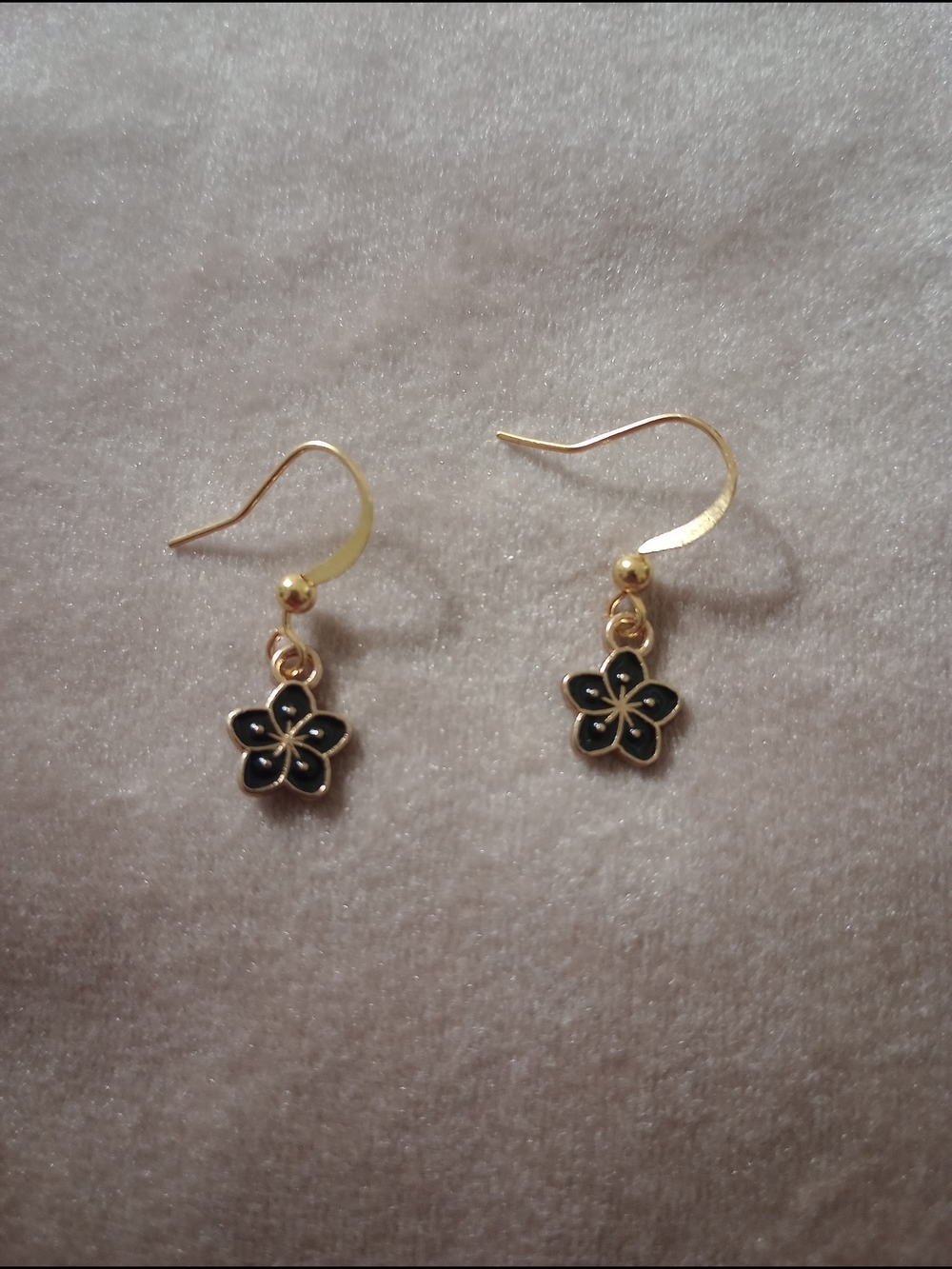 Gold Flower Dangle Earrings with Black Enamel Accent